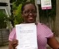 Jackie with Driving test pass certificate